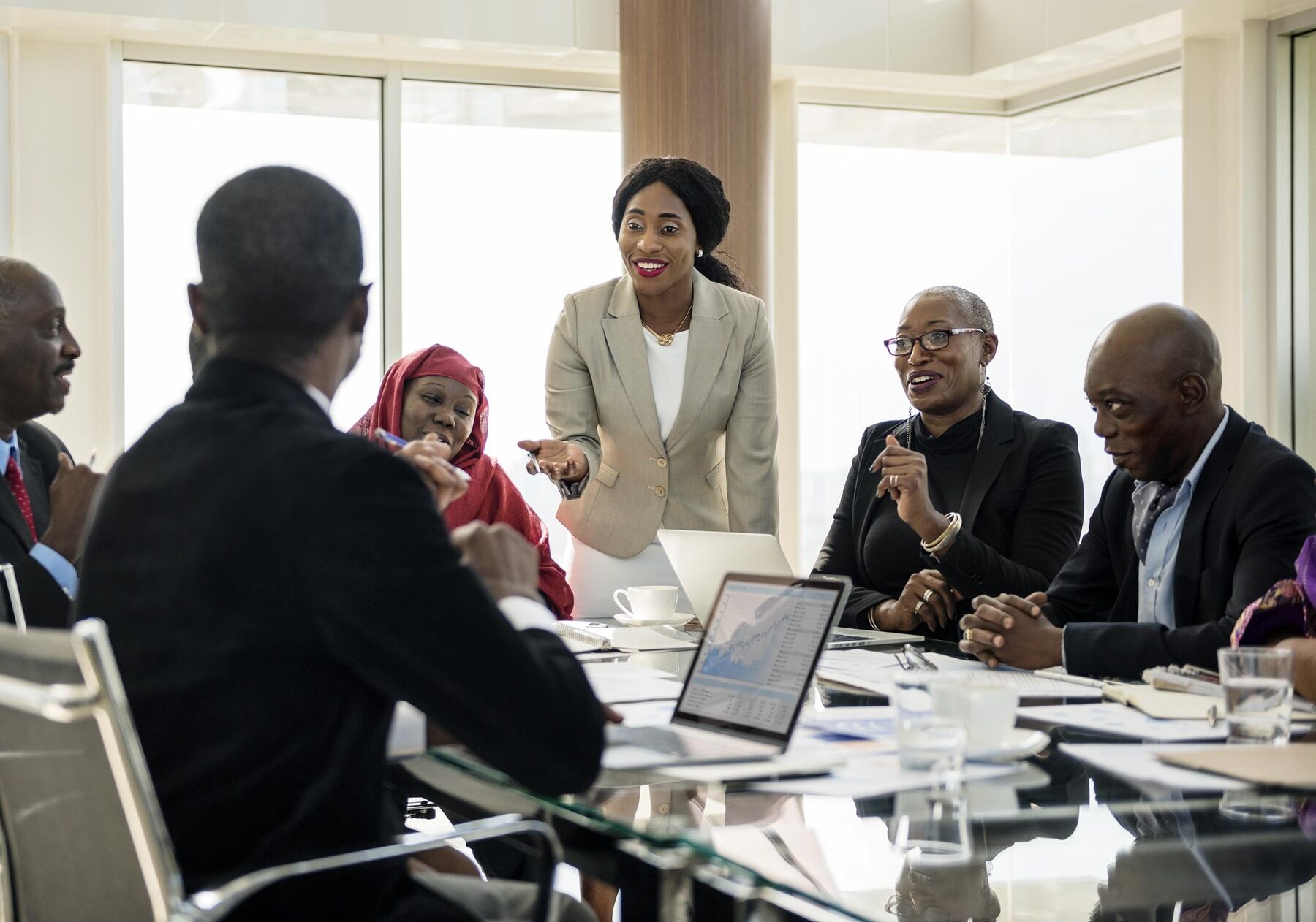 IFC consultants briefing a client board on financial strategy