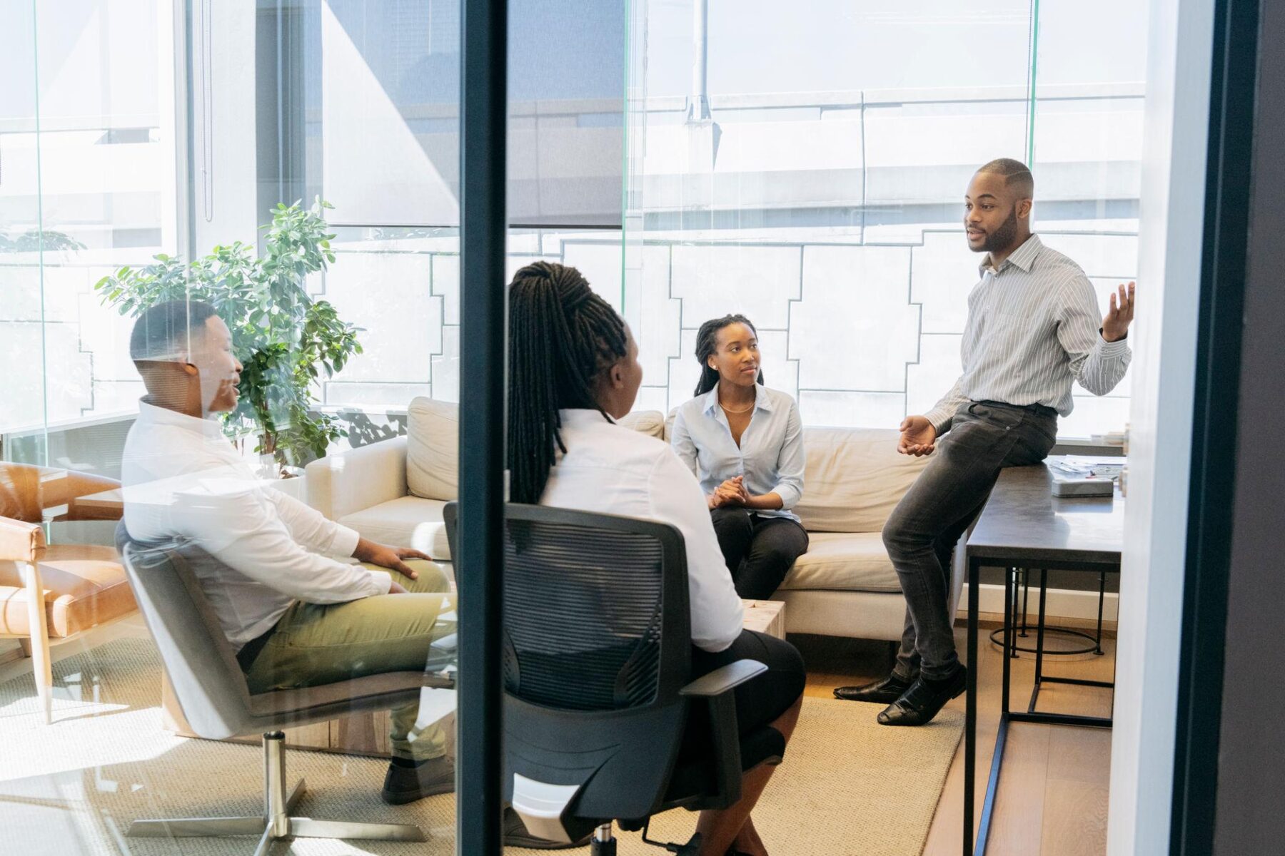 IFC team members in an informal strategy discussion